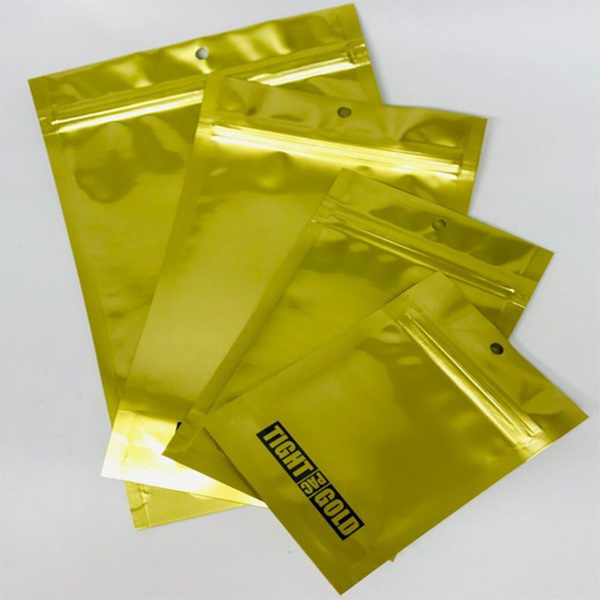 BOLSA TIGHT PAC GOLD MEDIANA